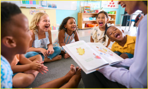 A Librarian reading to a group of children.  